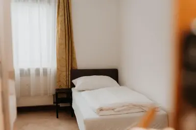 Ein Bett oder Betten in einem Zimmer der Unterkunft Appartement Zentrum