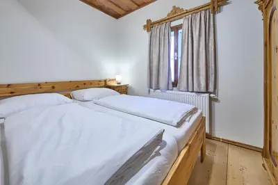 Ein Bett oder Betten in einem Zimmer der Unterkunft Haus Erni