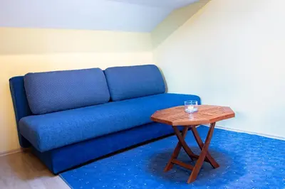 Ein Sitzbereich in der Unterkunft Gästehaus Kübler
