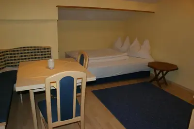Ein Bett oder Betten in einem Zimmer der Unterkunft Gästehaus Kübler