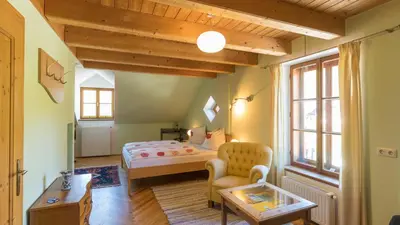 Ein Bett oder Betten in einem Zimmer der Unterkunft Schweizerhof am See