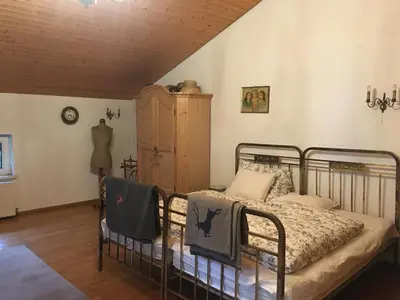 Ein Bett oder Betten in einem Zimmer der Unterkunft Apartment zum gemütlichen Karl