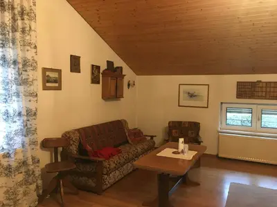 Ein Sitzbereich in der Unterkunft Apartment zum gemütlichen Karl