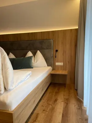 Ein Bett oder Betten in einem Zimmer der Unterkunft Ski & Bike Appartements