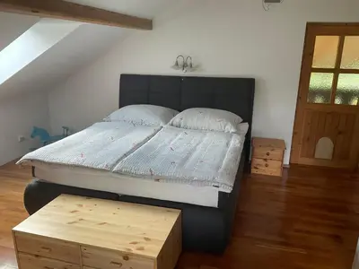 Ein Bett oder Betten in einem Zimmer der Unterkunft Ferienwohnung Dallinger
