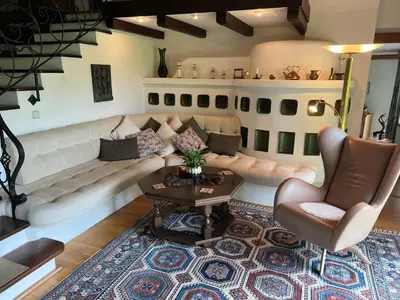 Ein Sitzbereich in der Unterkunft Die Landhausvilla in Unterach am Attersee