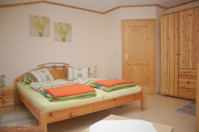 Ein Bett oder Betten in einem Zimmer der Unterkunft Ferienwohnung Hofer