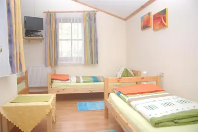 Ein Bett oder Betten in einem Zimmer der Unterkunft Ferienwohnung Hofer