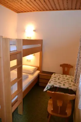 Ein Bett oder Betten in einem Zimmer der Unterkunft Landhaus Buchsteiner