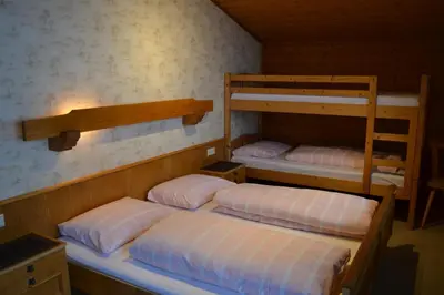 Ein Bett oder Betten in einem Zimmer der Unterkunft Landhaus Buchsteiner