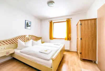 Ein Bett oder Betten in einem Zimmer der Unterkunft Ferienwohnung Aigner im Salzburger Lungau