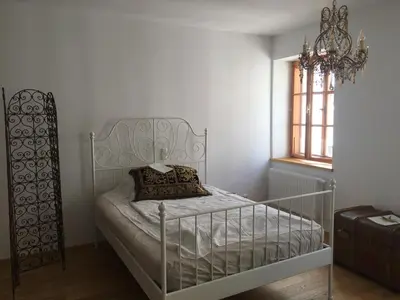 Ein Bett oder Betten in einem Zimmer der Unterkunft Apartment zur schönen Sophie