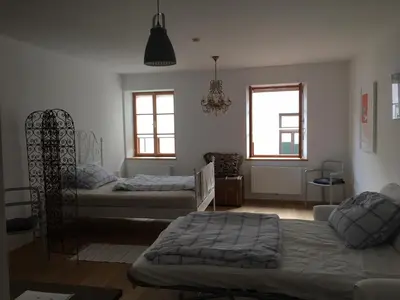Ein Bett oder Betten in einem Zimmer der Unterkunft Apartment zur schönen Sophie