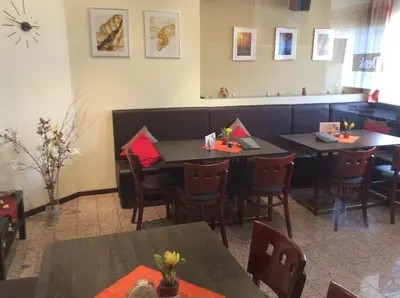 Ein Sitzbereich in der Unterkunft Hotel Denk Bed & Breakfast