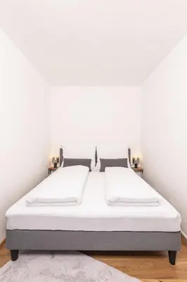 Ein Bett oder Betten in einem Zimmer der Unterkunft Apartment - Lärchenhof