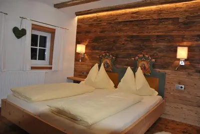 Ein Bett oder Betten in einem Zimmer der Unterkunft Plaik-Häusl
