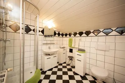 Ein Badezimmer in der Unterkunft Haus Silberdistel