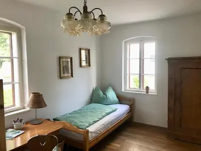 Ein Bett oder Betten in einem Zimmer der Unterkunft Haus Traundorf
