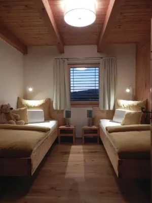 Ein Bett oder Betten in einem Zimmer der Unterkunft Das Grasberghaus