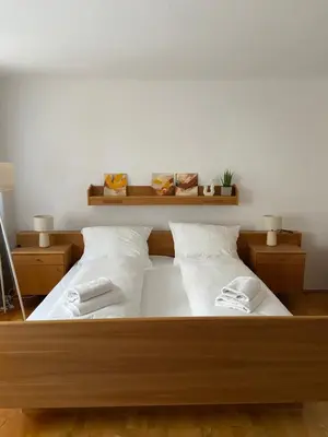 Ein Bett oder Betten in einem Zimmer der Unterkunft Zentrale Wohnung Gmunden Alte Bäckerei