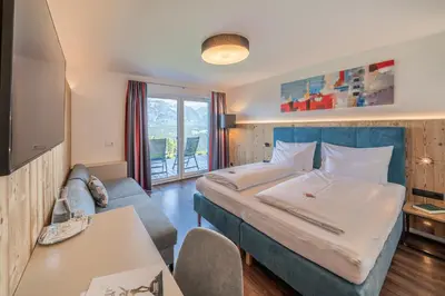 Ein Bett oder Betten in einem Zimmer der Unterkunft Hotel Winterer