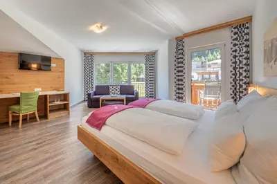Ein Bett oder Betten in einem Zimmer der Unterkunft Hotel Winterer