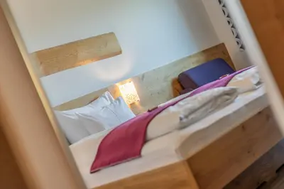 Ein Bett oder Betten in einem Zimmer der Unterkunft Hotel Winterer