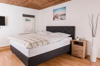 Ein Bett oder Betten in einem Zimmer der Unterkunft Central-Inn Werfen