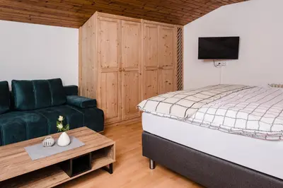 Ein Bett oder Betten in einem Zimmer der Unterkunft Central-Inn Werfen