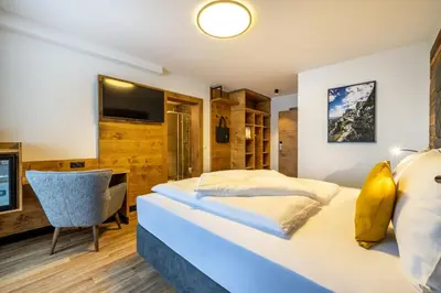 Ein Bett oder Betten in einem Zimmer der Unterkunft Aparthotel Fuxbau