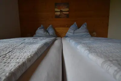 Ein Bett oder Betten in einem Zimmer der Unterkunft Grimmingblick Energiequelle