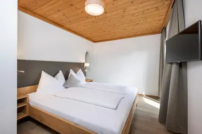 Ein Bett oder Betten in einem Zimmer der Unterkunft Apartments Untersüßgut Eben