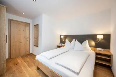 Ein Bett oder Betten in einem Zimmer der Unterkunft Apartments Untersüßgut Eben