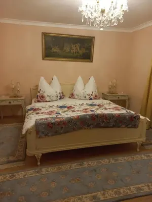 Ein Bett oder Betten in einem Zimmer der Unterkunft Ferienwohnung Felicitas mit Sauna by Appartementhaus Theresia