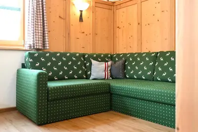 Ein Sitzbereich in der Unterkunft Ferienappartement Royer