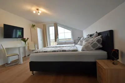Ein Bett oder Betten in einem Zimmer der Unterkunft Almblick Energiequelle