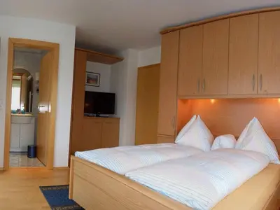 Ein Bett oder Betten in einem Zimmer der Unterkunft Haus Bauer Appartment II mit Balkon