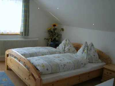 Ein Bett oder Betten in einem Zimmer der Unterkunft Haus Bauer Appartment I mit Balkon