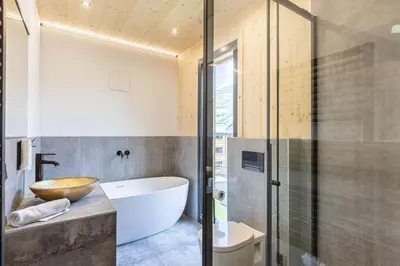 Ein Badezimmer in der Unterkunft Kreischberg Pool Villas & Penthouses by ALPS RESORTS