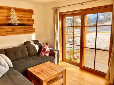 Ein Sitzbereich in der Unterkunft Chalet Mama