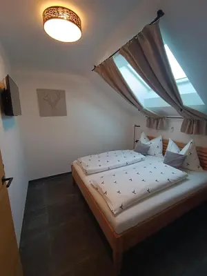 Ein Bett oder Betten in einem Zimmer der Unterkunft Murperle
