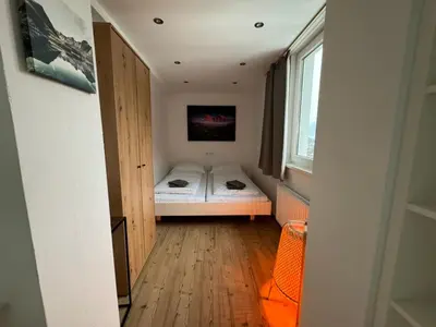 Ein Bett oder Betten in einem Zimmer der Unterkunft GO FOR MOUNTAINS Appartements