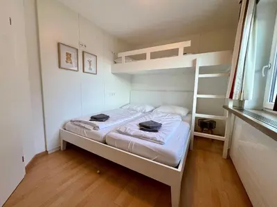 Ein Bett oder Betten in einem Zimmer der Unterkunft GO FOR MOUNTAINS Appartements