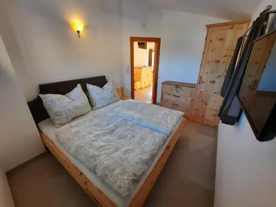 Ein Bett oder Betten in einem Zimmer der Unterkunft Bauernhaus Chalet Unterkoller