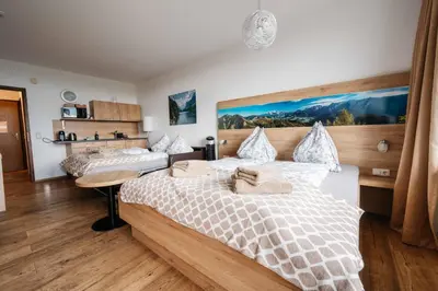 Ein Bett oder Betten in einem Zimmer der Unterkunft Ferienwohnung Margareta