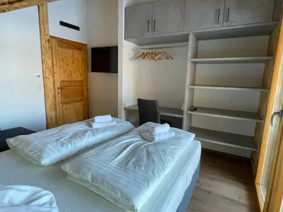Ein Bett oder Betten in einem Zimmer der Unterkunft Hillside Chalet Kreischberg