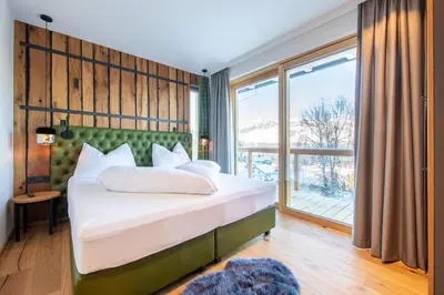 Ein Bett oder Betten in einem Zimmer der Unterkunft Höflehner Premium Eco Lodge