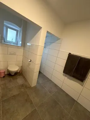 Ein Badezimmer in der Unterkunft Appartement Niederthalheim