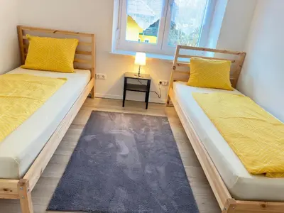 Ein Bett oder Betten in einem Zimmer der Unterkunft Appartement Niederthalheim