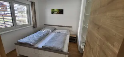 Ein Bett oder Betten in einem Zimmer der Unterkunft Ferienwohnung Jenny